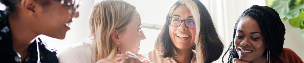 4 women talking about sales plans